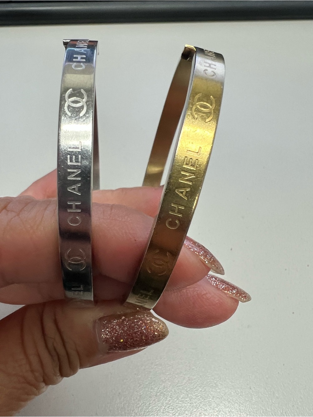 Chanel, LV, Gucci Stackable Silver and Gold Logo Bangle Set - Picture 6 of 16